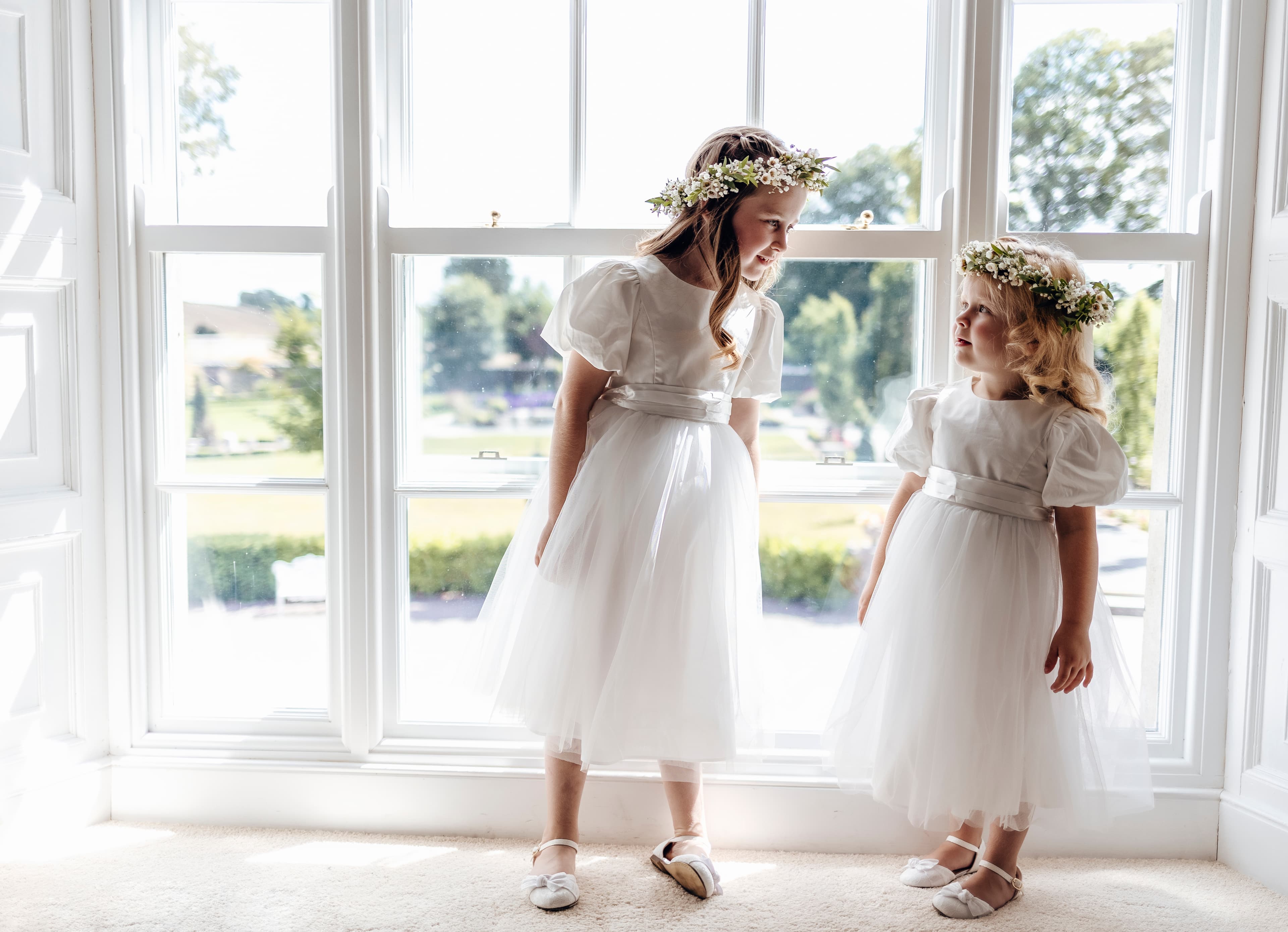 Flower girls at the window